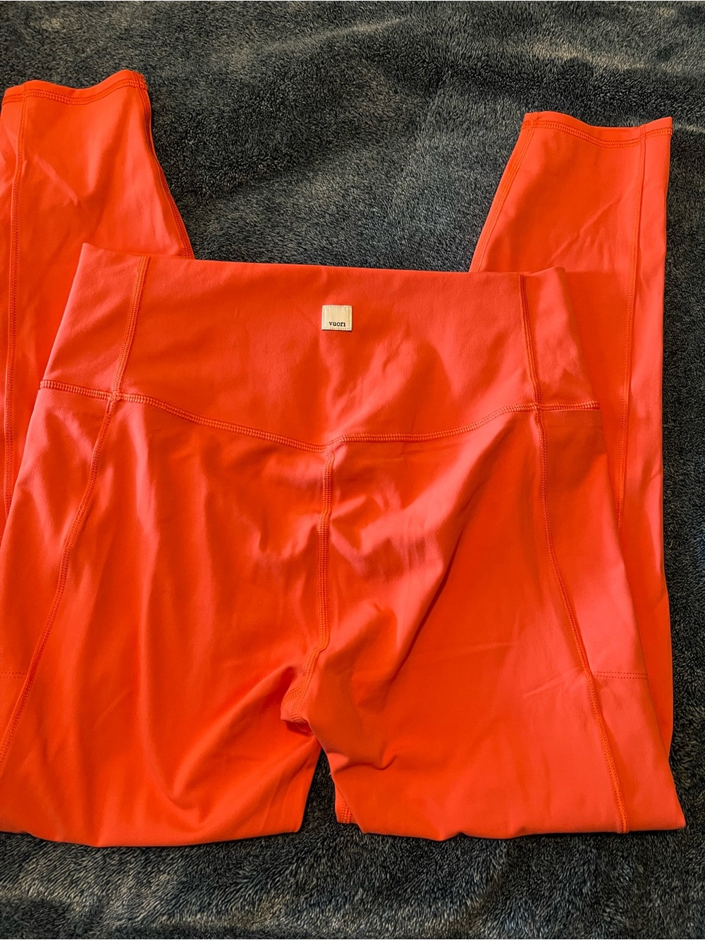 Vuori Studio Pocket Legging in Vibrant Coral-Red